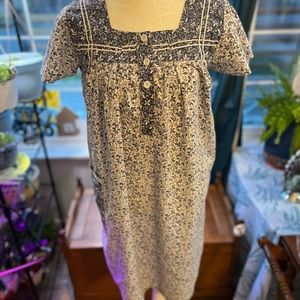 Vintage 1950s house dress with strawberry vine print pattern